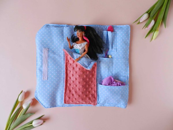 barbie-doll-with-black-hair-in-cotton-blue-sleeping-bag