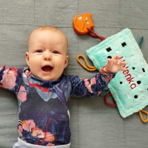 baby with sensory toy, with soft toy with name and wooden fox teether